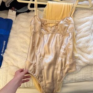 Anna October bodysuit and sheer dress